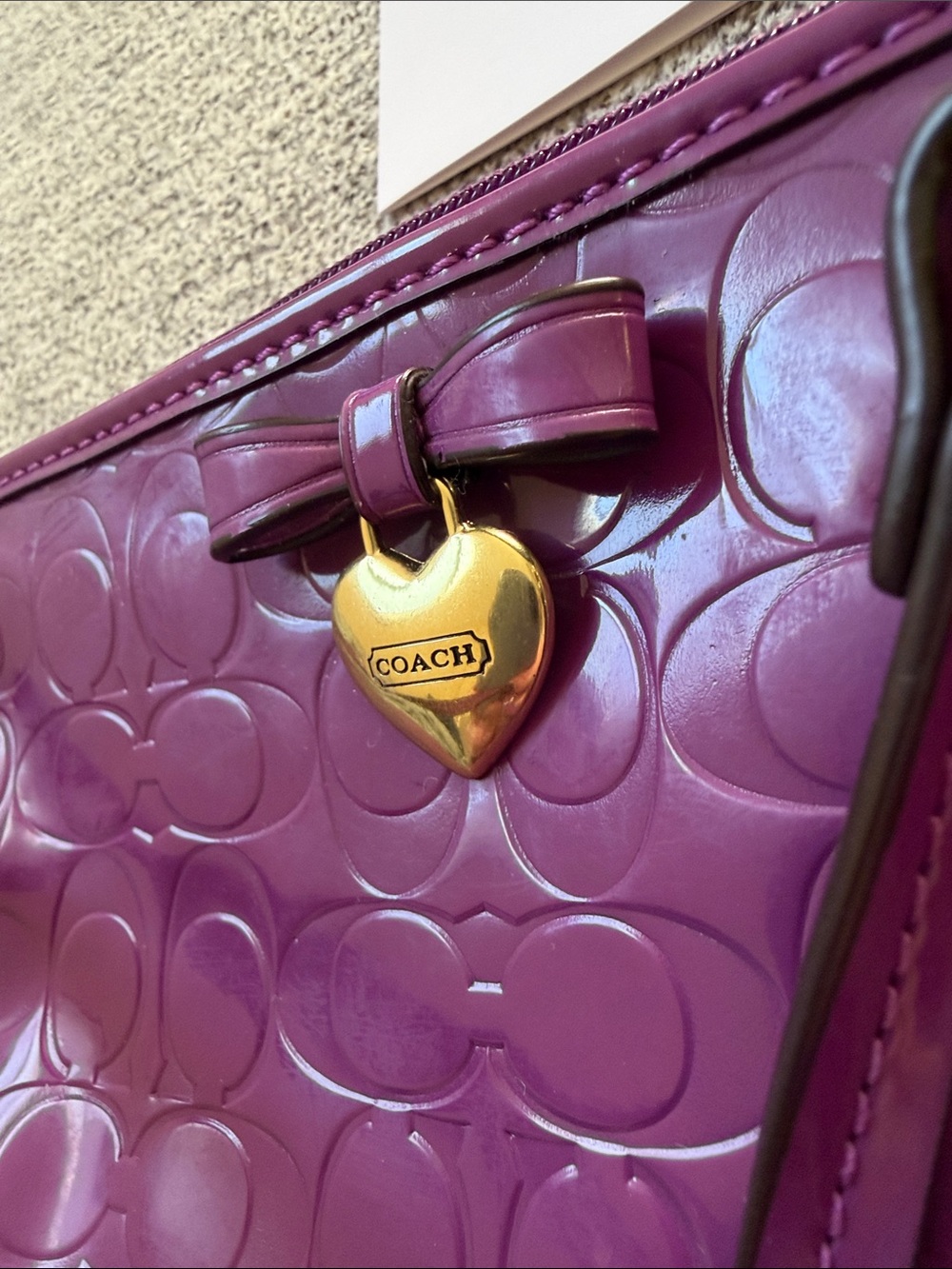 Coach Patent Signature Wristlet in Plum with Gold Heart Charm - Picture 5 of 5